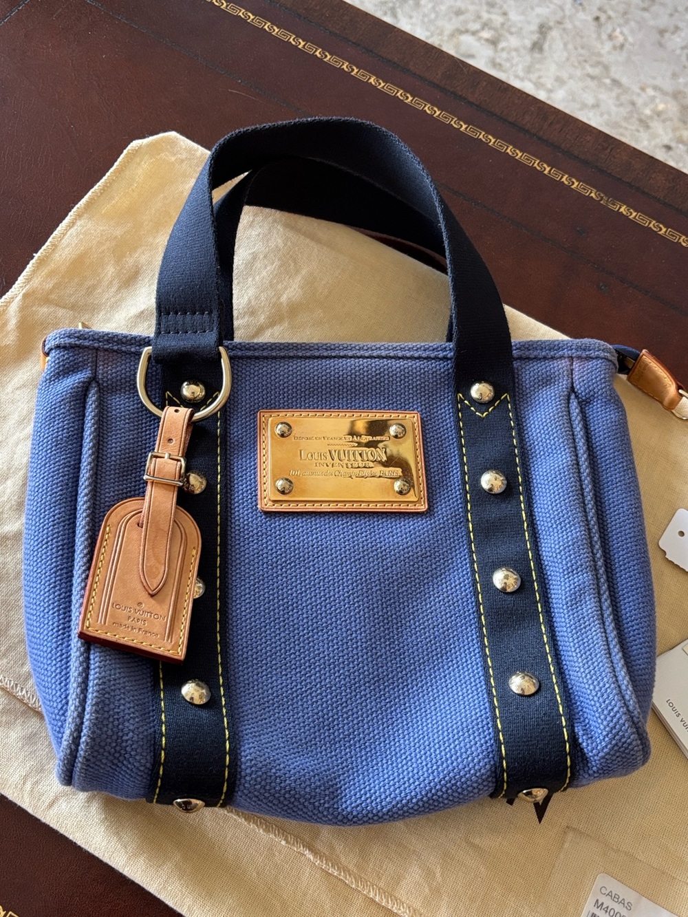 Louis Vuitton Antigua Cabas PM in blue canvas, model number M40090.